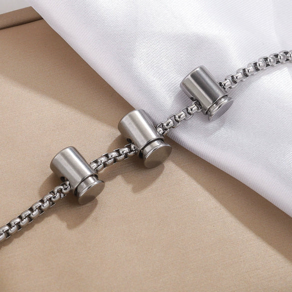 Stainless Steel Bell Elastic Spring Push Pull Adjustment Titanium Steel Buckle Accessories Handmade Chain Positioning Button With Hirback Pattern And Electroplating Treatment