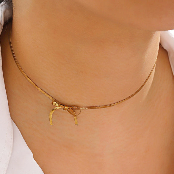 Stainless Steel Bow Clavicle Chain Retro Snake Bone Necklace For Ladies With Electroplating Treatment