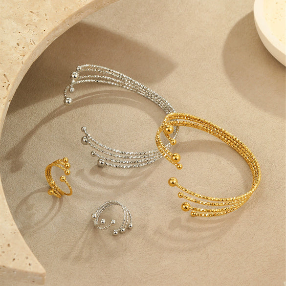 Stainless Steel Bracelet And Ring Electroplated With 18K Gold Geometric Pattern Hand Jewelry For Women