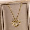 Stainless Steel Geometric Hollow Heart Pendant Necklace With Electroplating And Cross Chain Design For Unisex