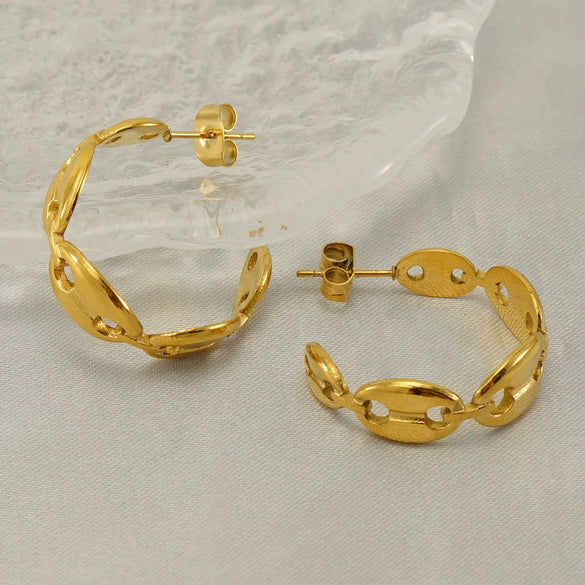 Stainless Steel Geometric Hollow Pig Nose Earrings Electroplated Fashion Design
