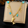 Stainless Steel Goldplated Blue Eyes Cross Portrait Head Pendant Necklace For Women Fashion Style