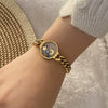 Stainless Steel Hollow Disc Dripping Oil Eye Palm Personality Women's Jewelry Bracelet With Electroplating