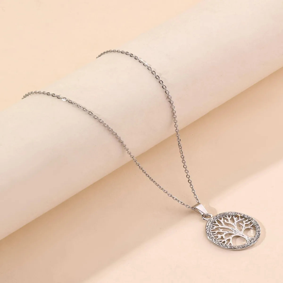 Stainless Steel Silver Plated Simple Style Round Tree Hollow Out Inlay Zircon Pendant Necklace