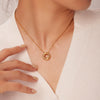 Stainless Steel Women's Necklace With 18K Gold Hollow Round Inlaid Zircon Pendant And Electroplating Treatment