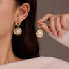Stainless Steel Women's Square Hollow Round Pearl Pendant Earrings With Electroplating
