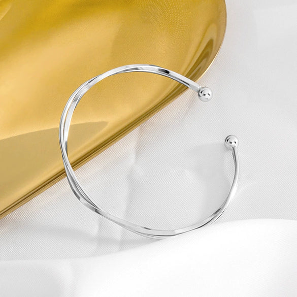 Sterling Silver Interwoven Bracelet With Mobius Ring Design And Electroplated Finish Simple Minimalist Jewelry