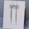 925 Sterling Silver Simple Bow Earrings For Women With Diamond Accents And Long Tassel Drop Design