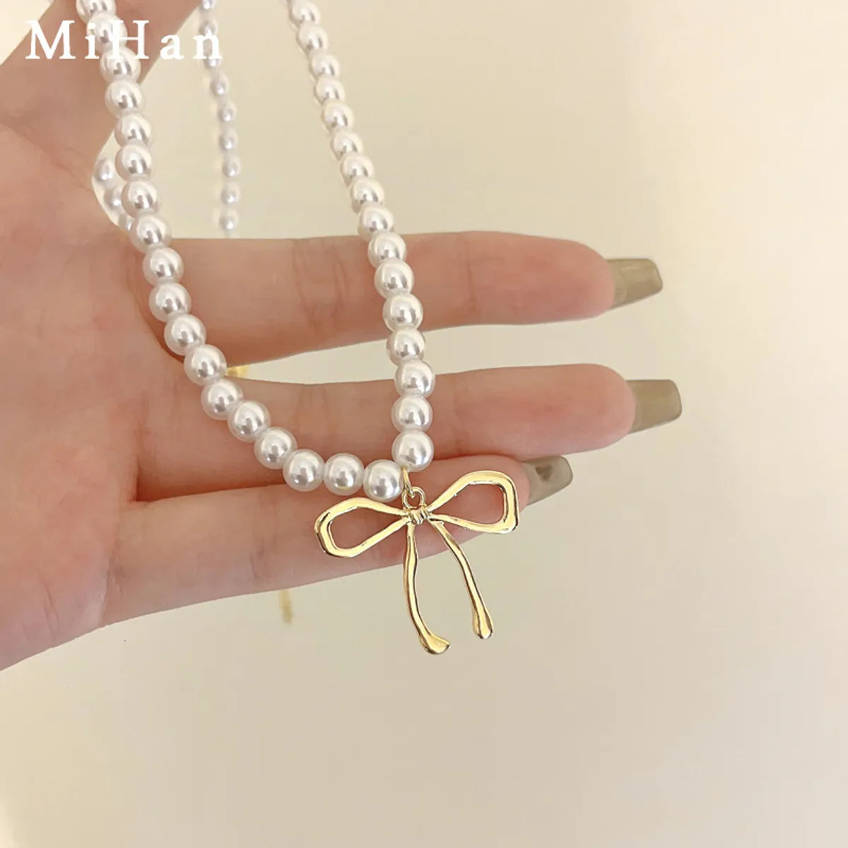 Sweet Bow Knot Imitation Pearl Alloy Wholesale Pendant Necklace