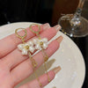 Sweet Geometric Flower Bow Knot Imitation Pearl Alloy Inlay Rhinestones Women'S Earrings 1 Pair