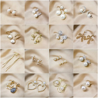 Sweet Heart Shape Bow Knot Alloy Plating Inlay Artificial Gemstones Women'S Ear Studs