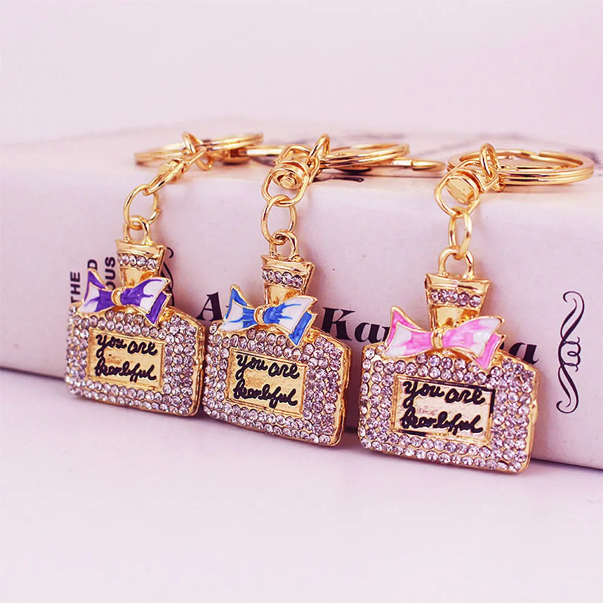 Sweet Perfume Bottle Zinc Alloy Plating Inlay Rhinestones Women'S Bag Pendant Keychain