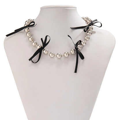 Sweet Simple Style Bow Knot Imitation Pearl Copper Knitting Necklace