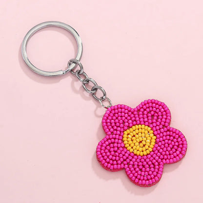 Sweet Simple Style Flower 304 Stainless Steel Nonwoven Glass Beaded Unisex Bag Pendant Keychain