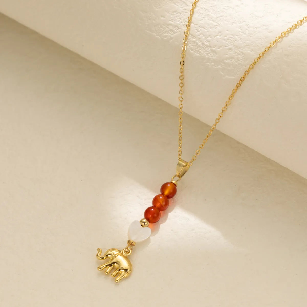 Sweet Simple Style Roman Style Heart Shape Elephant Alloy Natural Stone Shell Plating Pendant Necklace