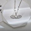 Wholesale Jewelry Sweet Wings Bow Knot Titanium Steel Copper Zircon Gold Plated Inlay Pendant Necklace