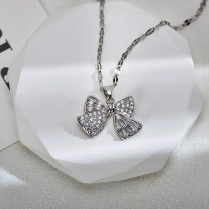 Wholesale Jewelry Sweet Wings Bow Knot Titanium Steel Copper Zircon Gold Plated Inlay Pendant Necklace