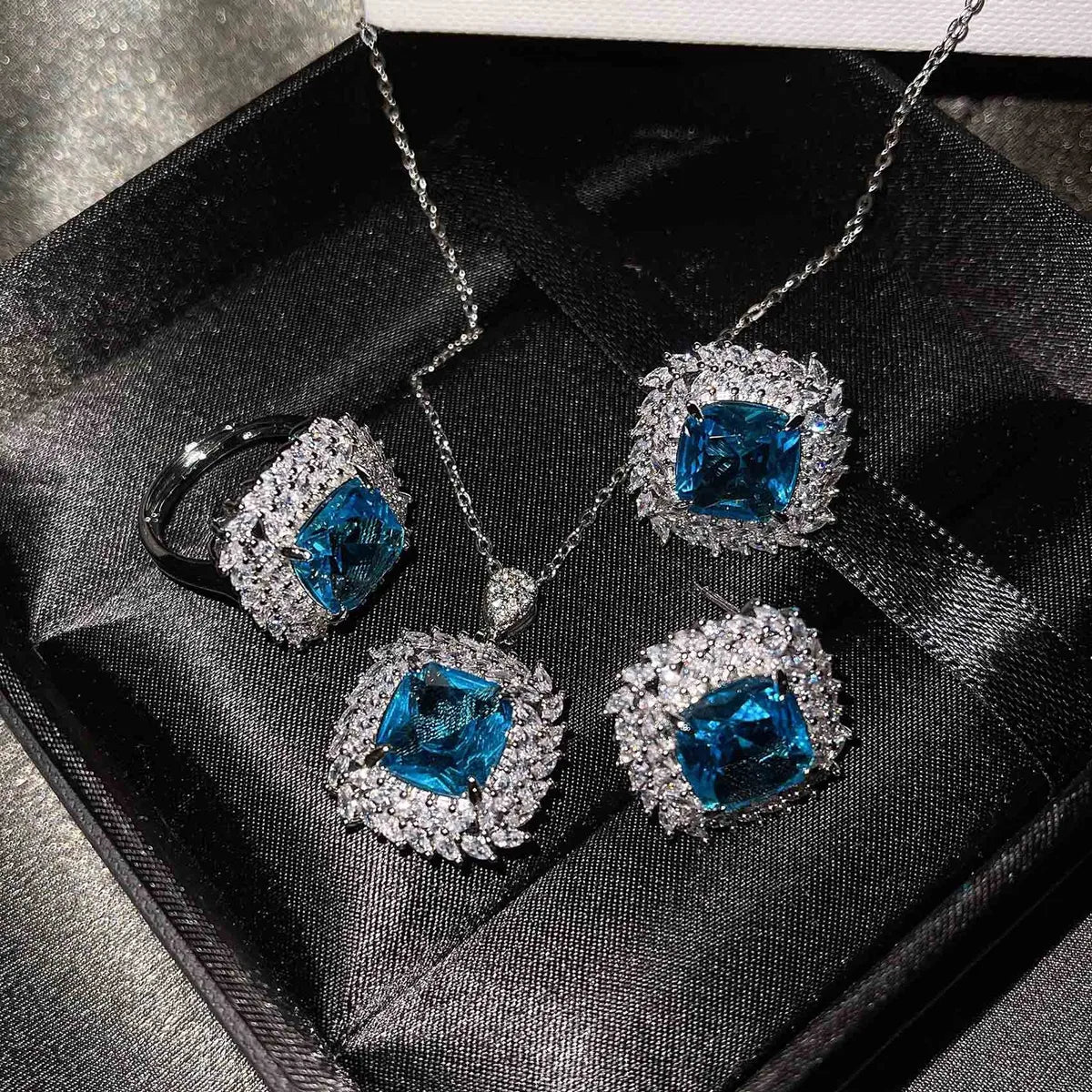 The New Luxury Color Treasure Set Inlaid With Ascher Yellow Diamonds Topa Blue Argyle Powder Ring Earrings Pendant