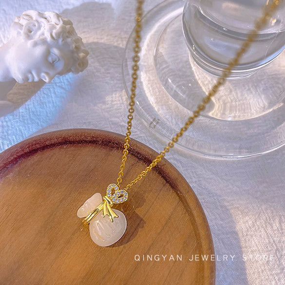 Titanium Steel And Copper Gourd Money Bag Pendant Necklace For Women With Electroplating Design