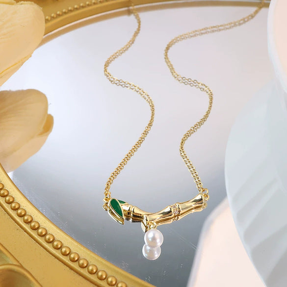 Titanium Steel And Copper Women's Light Luxury Jewelry Necklace With Real Gold Electroplated Pearl Pendant And Cross Chain Design