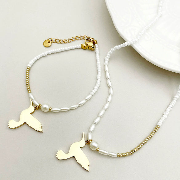 Titanium Steel Bird Pattern Pendant Necklace And Bracelet Set With Pearl Chain And Electroplating Design Simple Style Jewelry