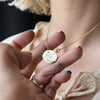 Titanium Steel Bow And Rabbit Element Pet Oval Tarot Necklace With Oil Dripping Pattern Colorpreserving 18K Gold Electroplating