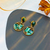 Titanium Steel Geometric Asymmetrical Cut Out Splicing Misaligned Round Earrings With Electroplating Treatment For Women