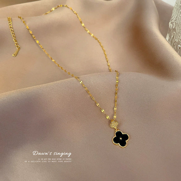 Titanium Steel Geometric Four Leaf Flower Pendant Necklace With Micro Inlaid Zircon And Tassel Detail Casual Cartoon Jewelry