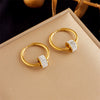 Titanium Steel Geometric Rotatable Pendant Earrings For Women With Electroplating Design