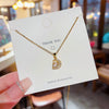 Titanium Steel Gold Inlaid Bow Pendant Necklace Cross Chain Style