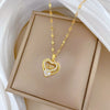 Titanium Steel Heartshaped Clavicle Chain With Copper Pendant And Geometric Pattern And Diamond Design