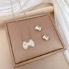 Titanium Steel Pearl Bow Geometric Cartoon Style Electroplated Unisex Necklace