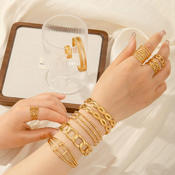 Titanium Steel Simple Versatile Hollow Pattern Ring And Adjustable Bracelet With Electroplating