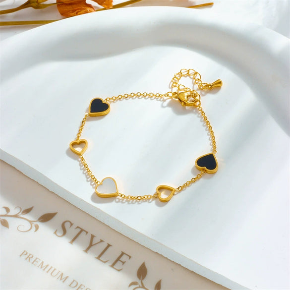 Titanium Steel Women's Black And White Hollow Love Pattern Electroplated Bracelet