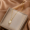 Titanium Steel Women's Cat's Eye Tulip Pendant Necklace With Flower Pattern And Electroplating Treatment