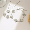 Titanium Steel Women's Fashion Versatile Laser Fourleaf Flower Set With Necklace Bracelet Earrings And Electroplating
