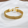 Titanium Steel Women's Jewelry Bracelet And Neckchain With Wave Pattern And Electroplating Processing