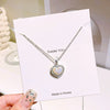 Titanium Steel Women's Light Luxury Heart Shape Diamond Inlay Pendant Necklace With Cross Chain