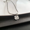 Titanium Steel Women's Lucky Grass Pendant Necklace With Geometric Pattern And Electroplating Treatment Light Luxury Style