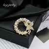 Trendy Pearl Bow Brooch Zinc Alloy Diamond Encrusted Electroplating Clothing Accessories Unisex