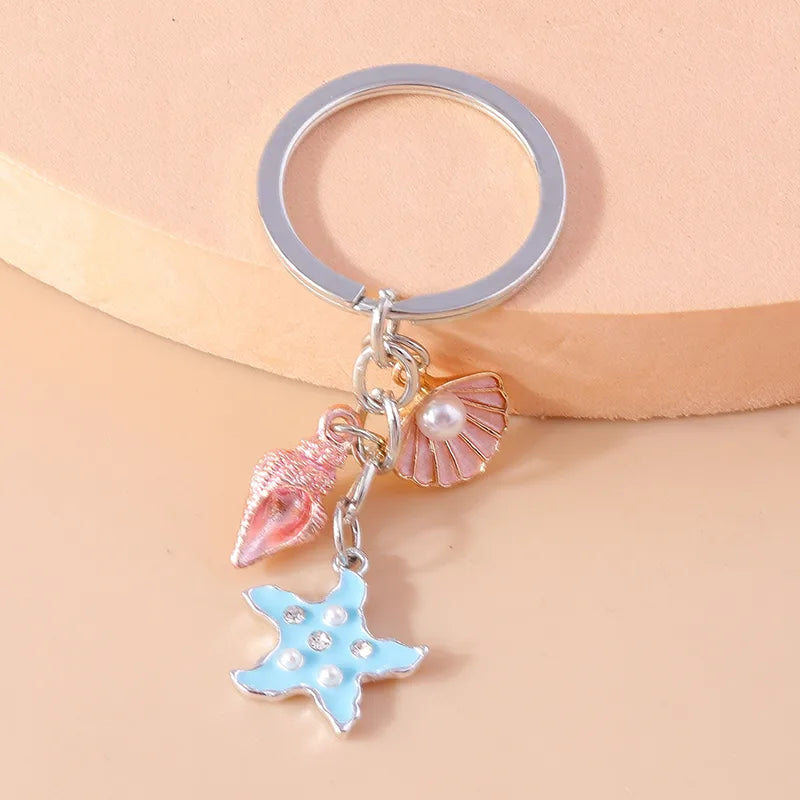 Vacation Beach Starfish Shell Alloy Plastic Bag Pendant Keychain