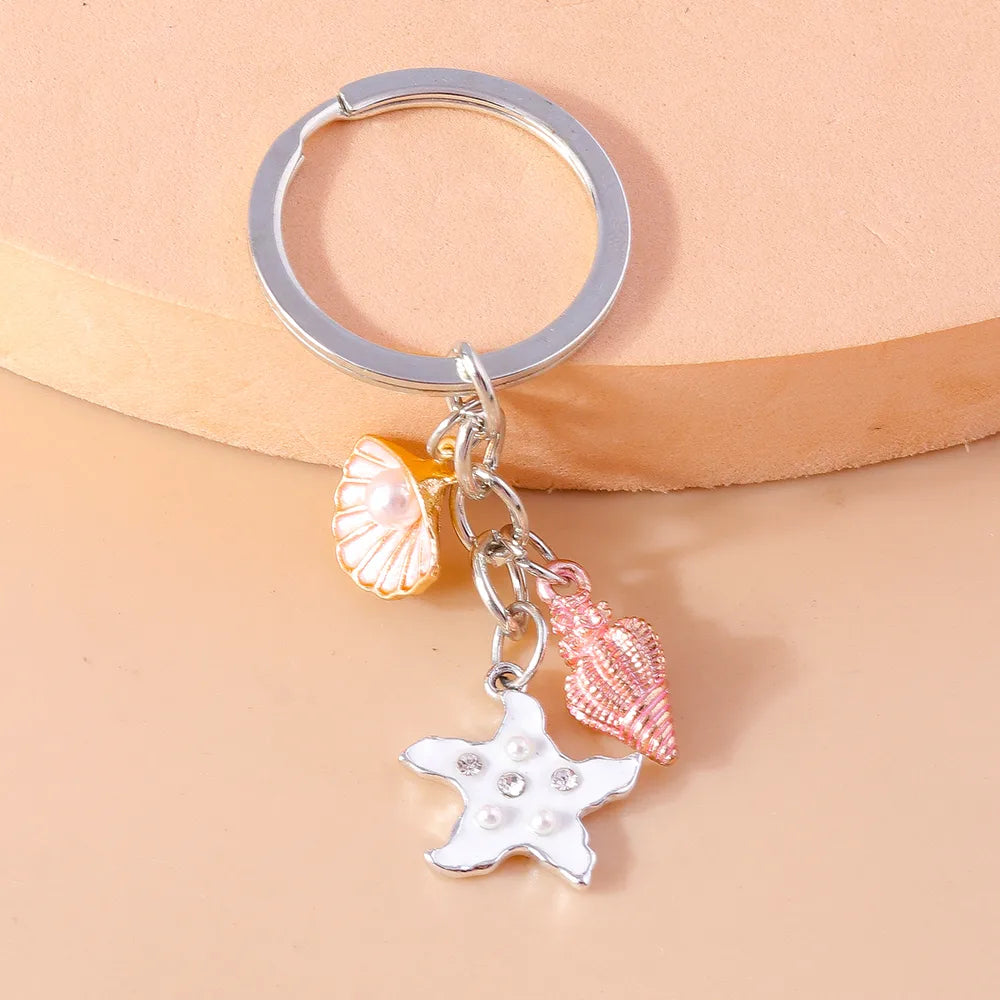 Vacation Beach Starfish Shell Alloy Plastic Bag Pendant Keychain