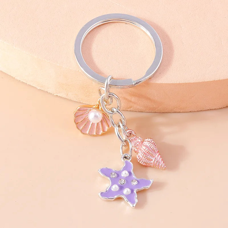 Vacation Beach Starfish Shell Alloy Plastic Bag Pendant Keychain