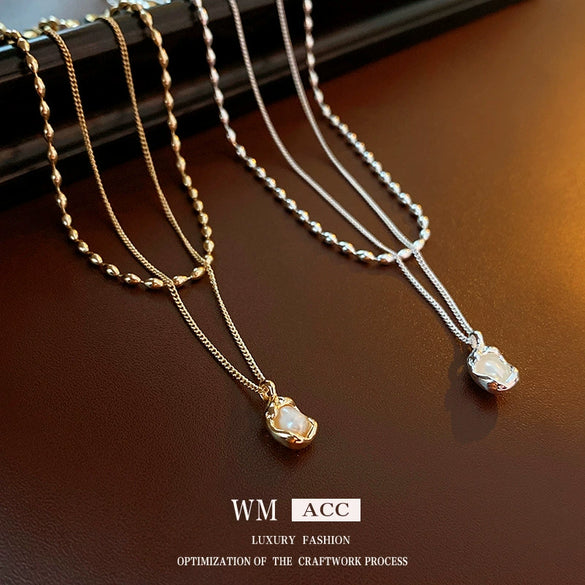 Wholesale Alloy And Copper Double Layer French Pleated Pearl Peas Clavicle Chain With Geometric Pattern And Electroplating Treatment Light Luxury Style For Women