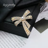 Wholesale Alloy Bow Geometric Rhinestone Pearl Women's Elegant Electroplated Brooch