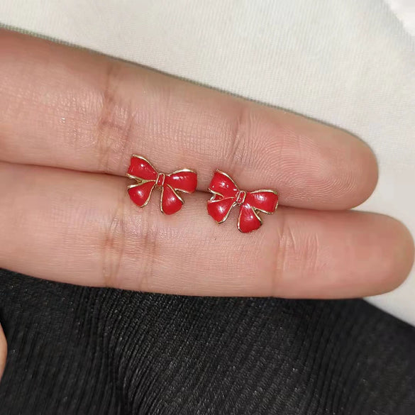 Wholesale Alloy Christmas Earrings With Elk And Cartoon Characters Electroplating Design