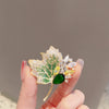 Wholesale Alloy Crystal Retro Hollow Maple Leaf Flower Brooch For Women With Electroplating