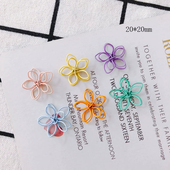 Wholesale Alloy Ear Jewelry Accessories With Color Petals Double Hollow Flowers And Baking Paint