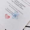 Wholesale Alloy Ear Jewelry Accessories With Color Petals Double Hollow Flowers And Baking Paint