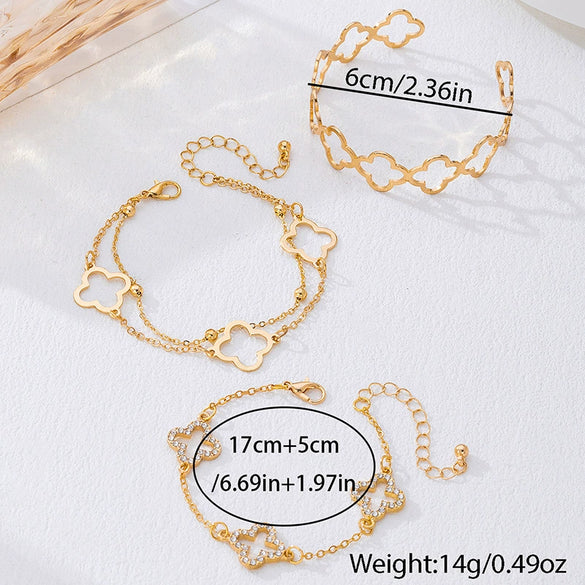 Wholesale Alloy Electroplated Exaggerated Geometric Hollow Fourleaf Clover Bracelet And Adjustable Ring Set For Women
